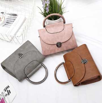 Hand strap shoulder bag